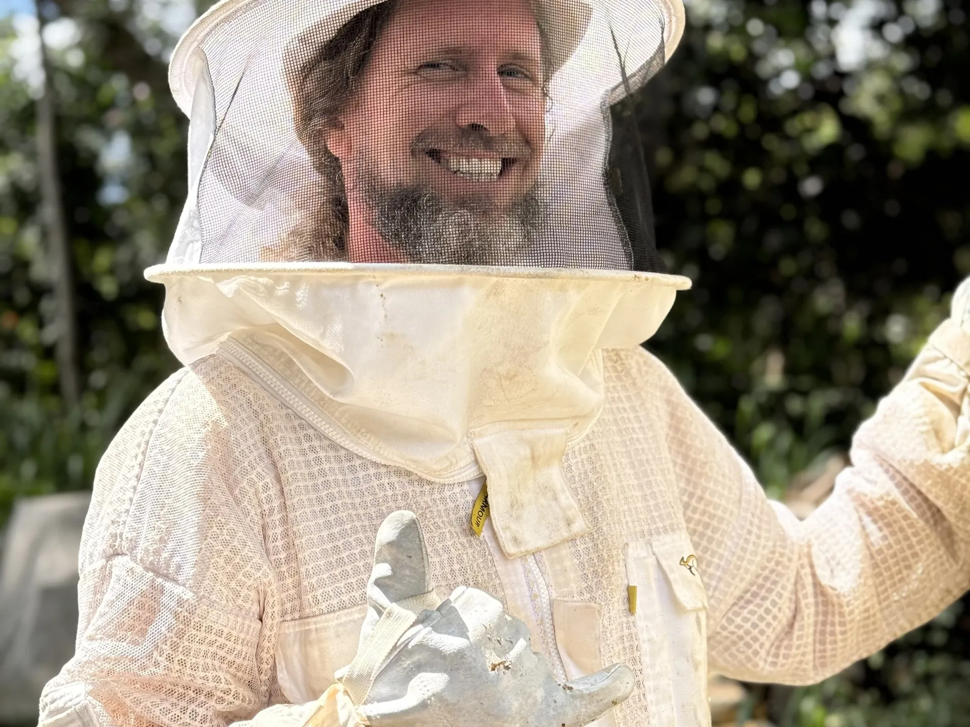 a statue of a person holding a teddy bear